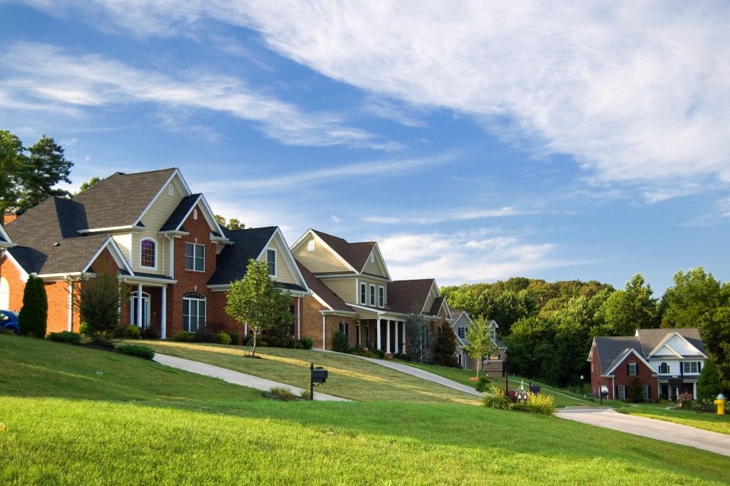 new-houses-in-front-of-green-space