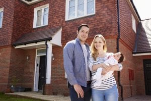 young-couple-with-baby-buy-new-house
